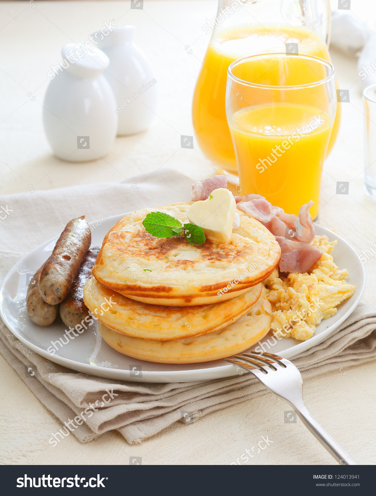 Orange Juice Pancakes Sausage Eggs and Bacon