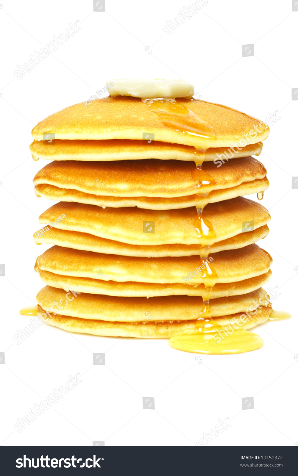 A Big Stack of Pancakes and Syrup Butter