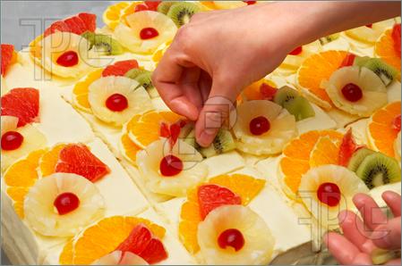 Decorating Cake with Fruit