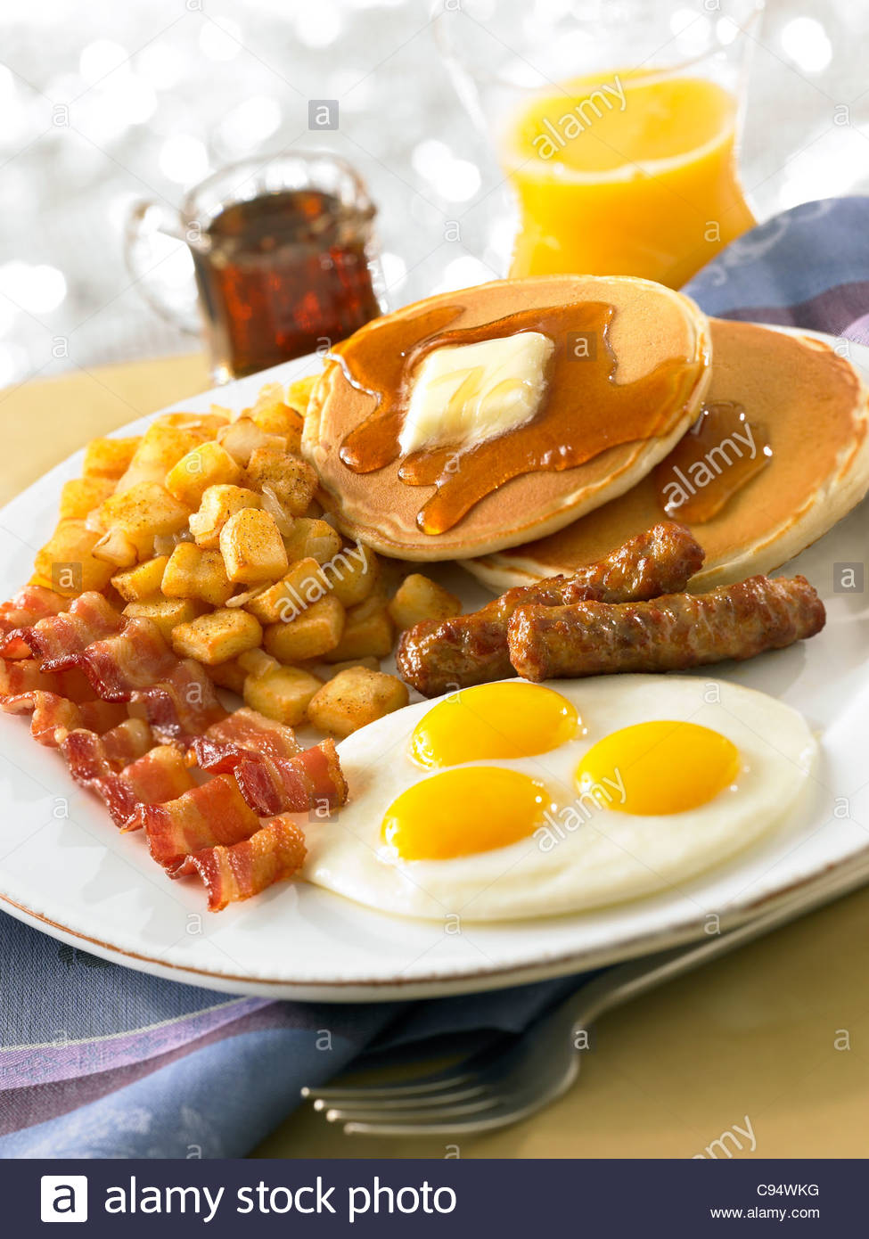 Orange Juice Pancakes Sausage Eggs and Bacon