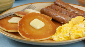 Pancake Sausage and Eggs Breakfast