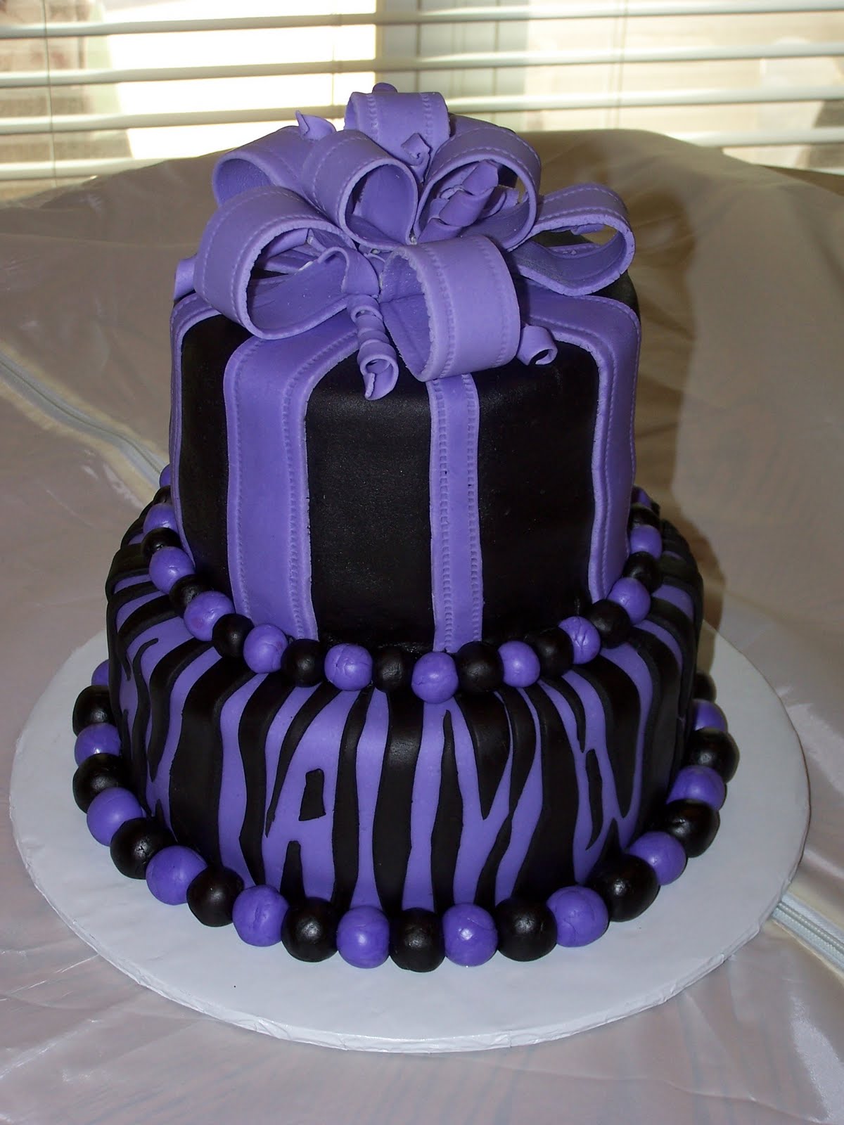 Purple and White Two Tier Birthday Cake