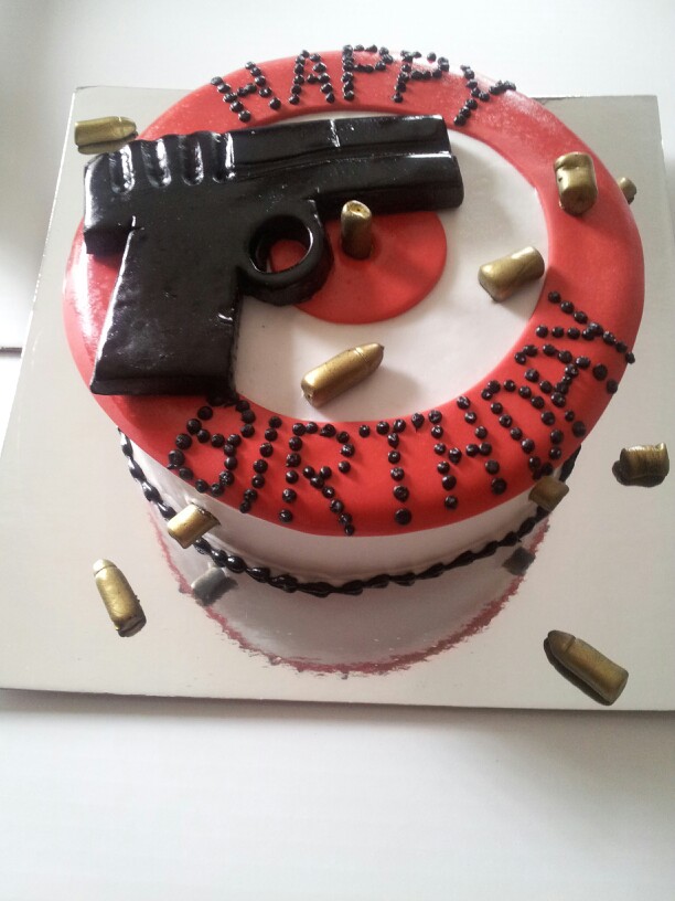 Happy Birthday Gun Cake