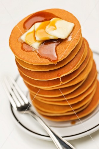 Stack of Pancakes with Syrup and Butter