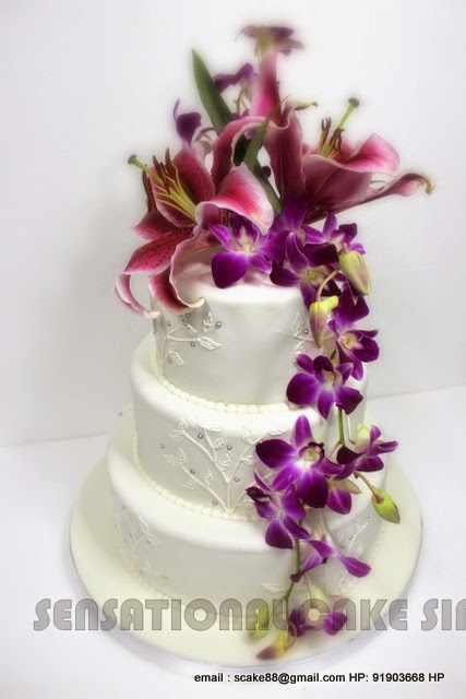 Purple Wedding Cake with Fresh Flowers