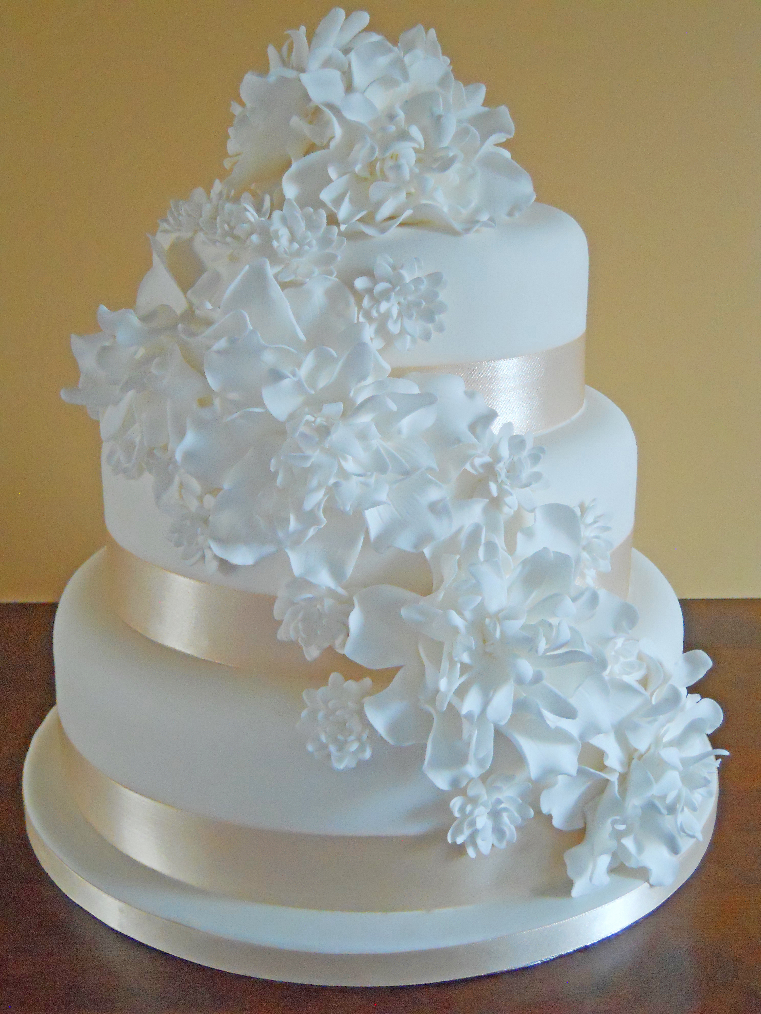 Gold Wedding Cake with Cascading Flowers