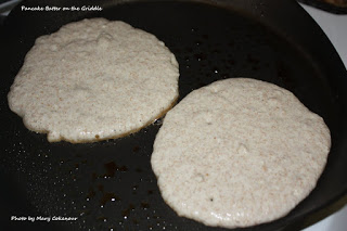 Pancake Batter On Griddle