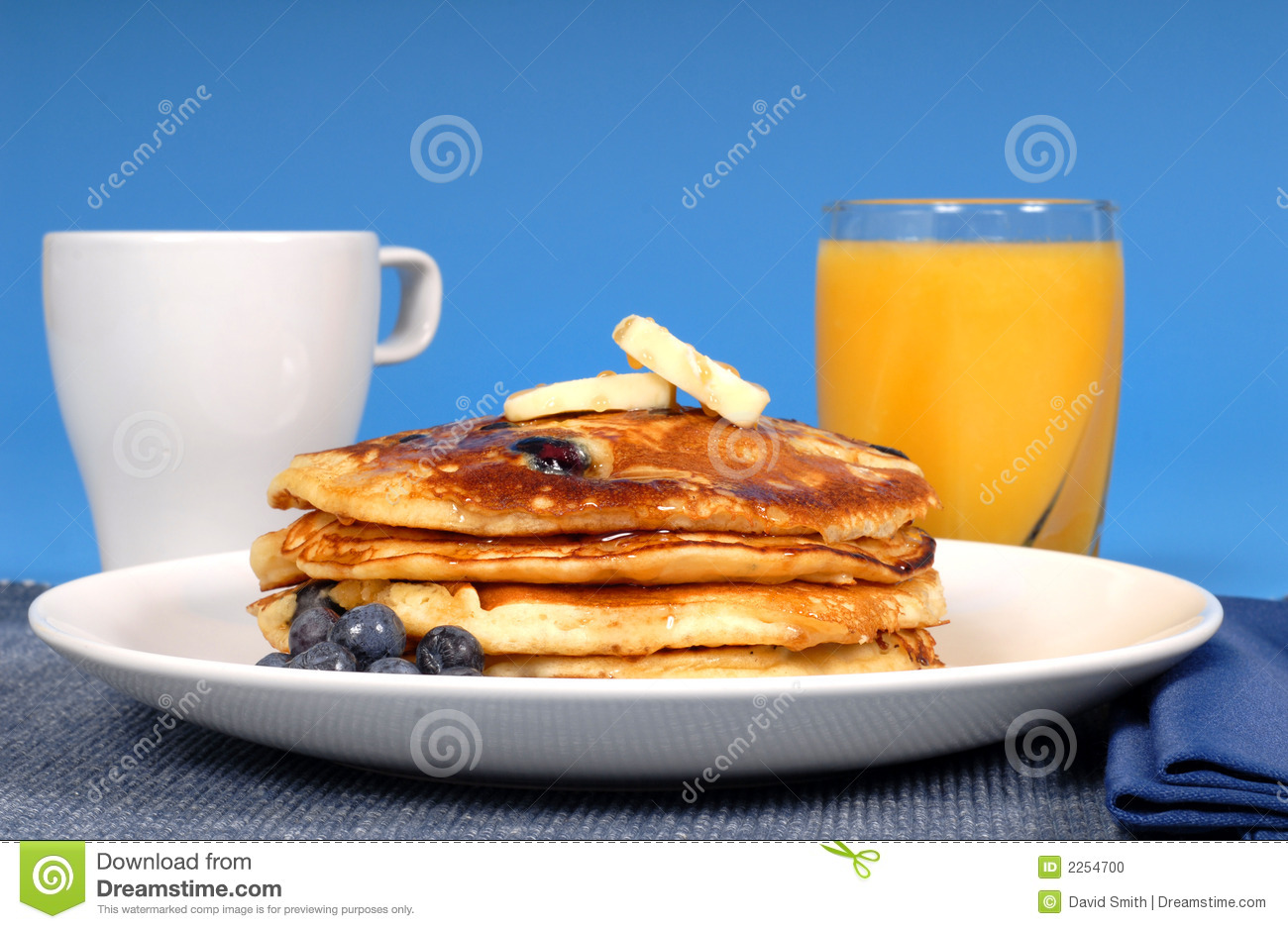 Blueberry Pancakes and Orange Juice