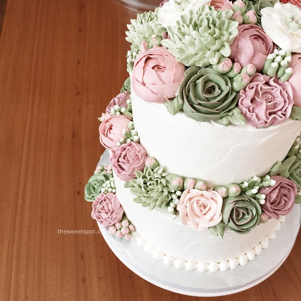 Buttercream Wedding Cake with Pink Flower