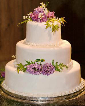 Decorating Wedding Cake with Flowers