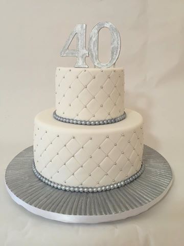 White and Silver Birthday Cakes