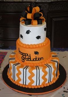 Orange and Black Graduation Cake