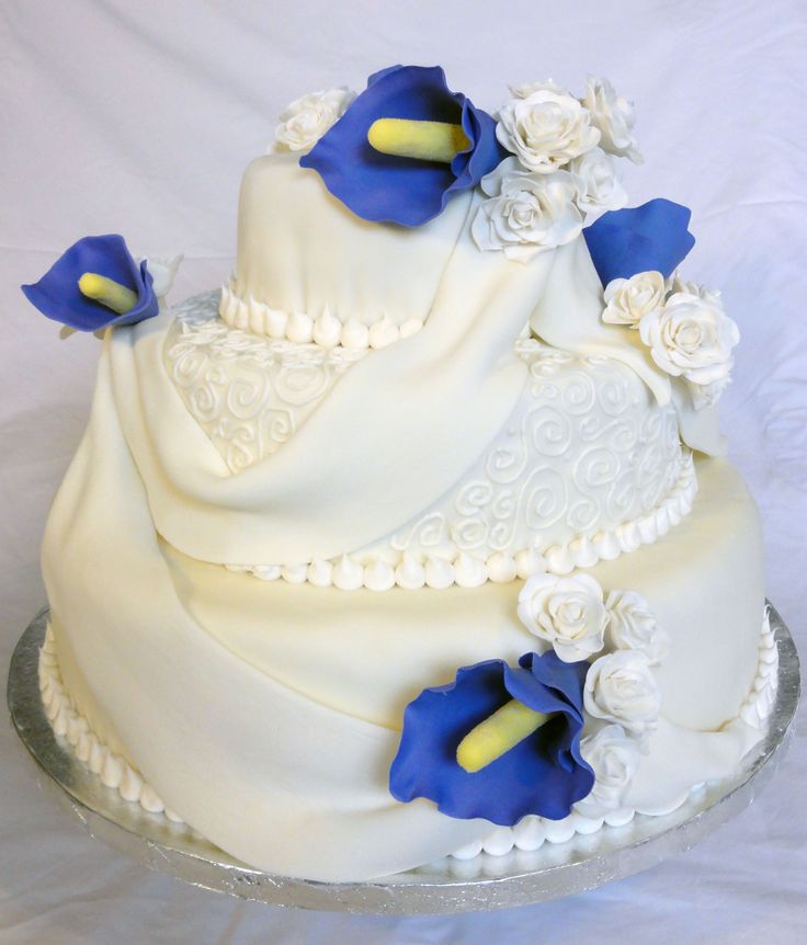 White Wedding Cake with Purple Calla Lilies