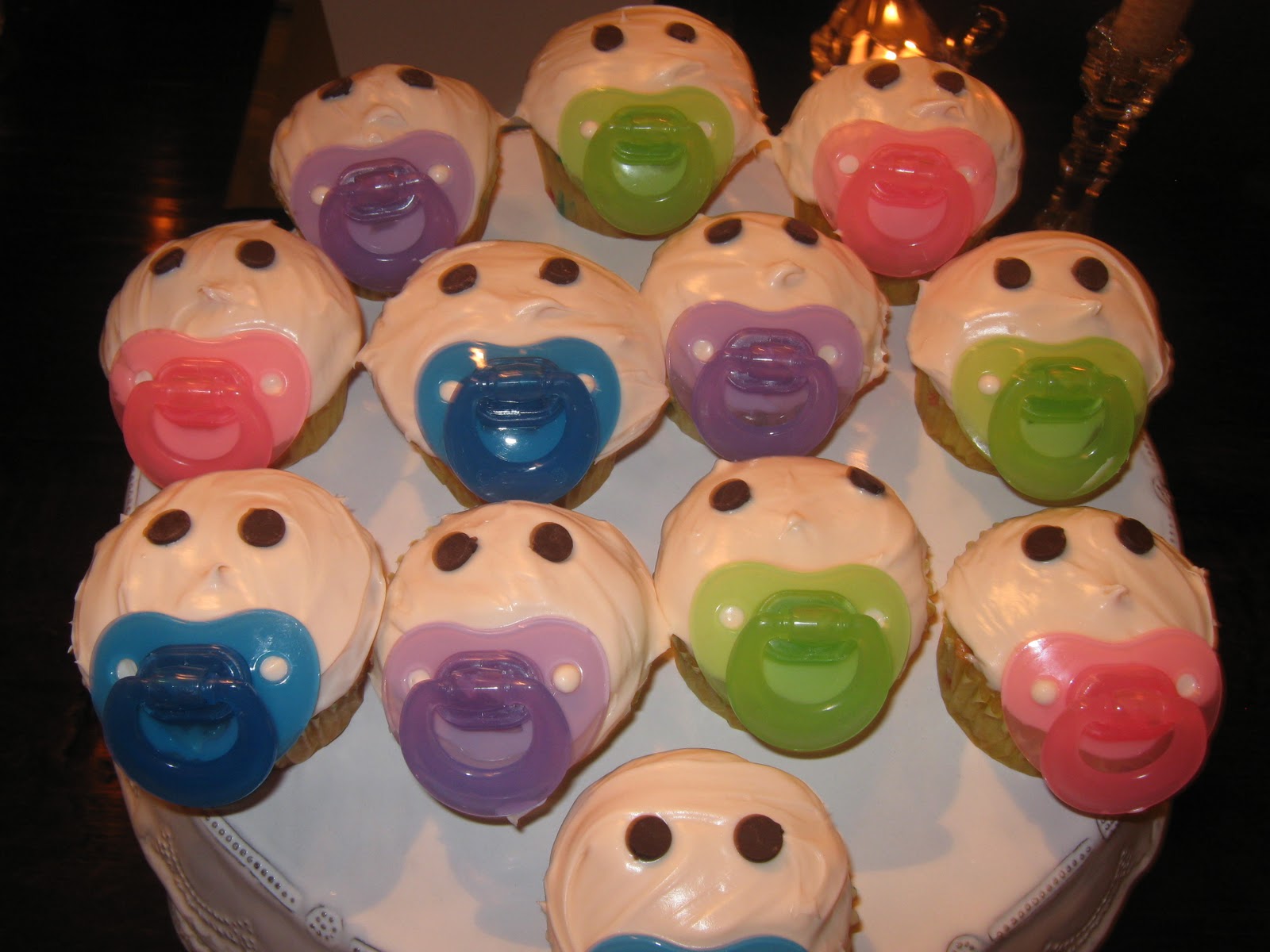 6 Photos of Baby Face Shower Cupcakes