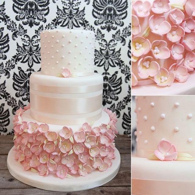 Wedding Cake with Ribbon and Pink Flowers