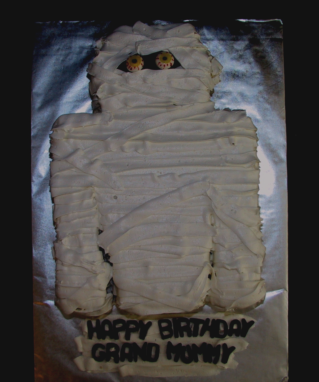 11 Photos of Halloween Mummy Birthday Cakes