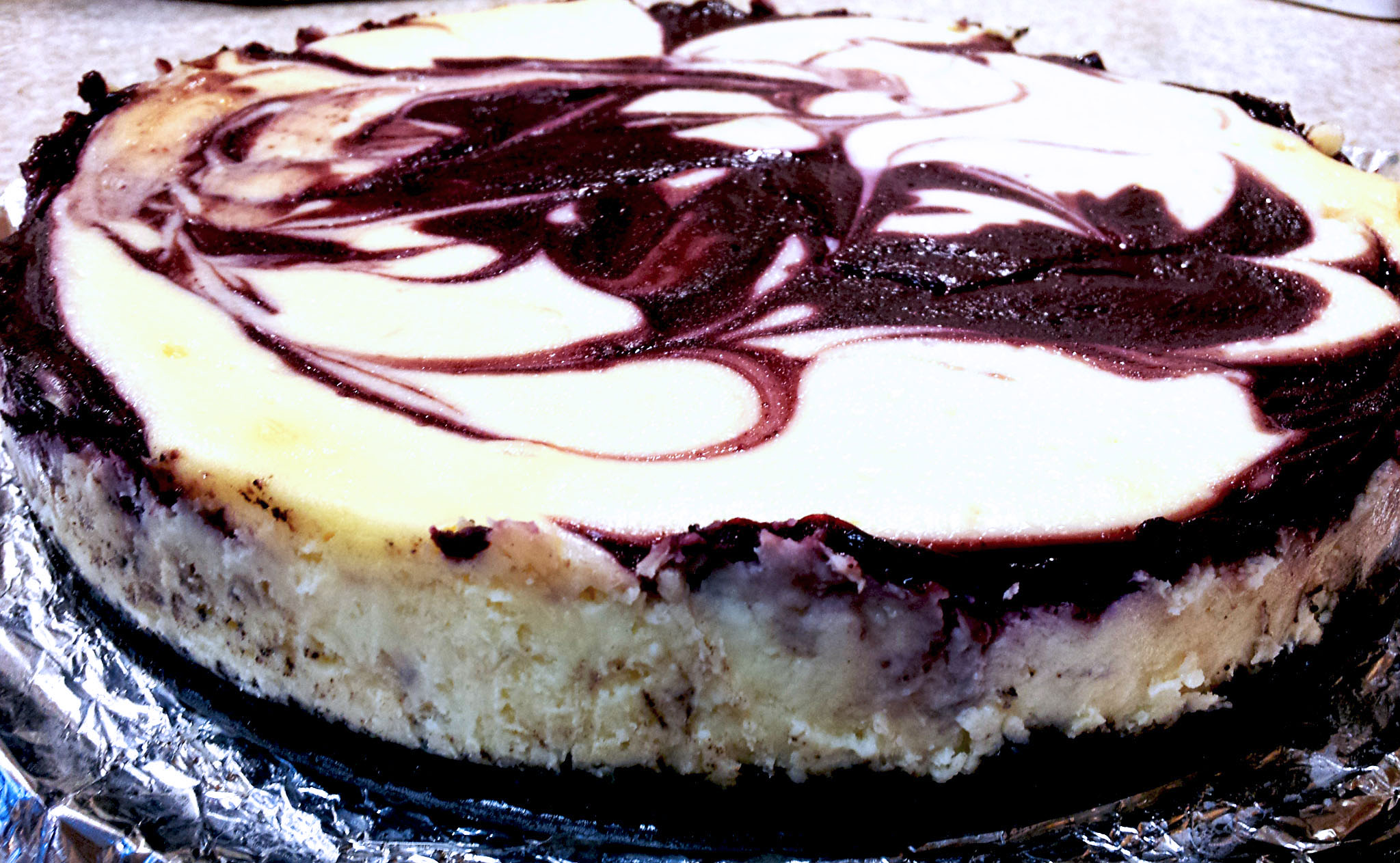 White Chocolate Raspberry Cheesecake with Oreo Crust