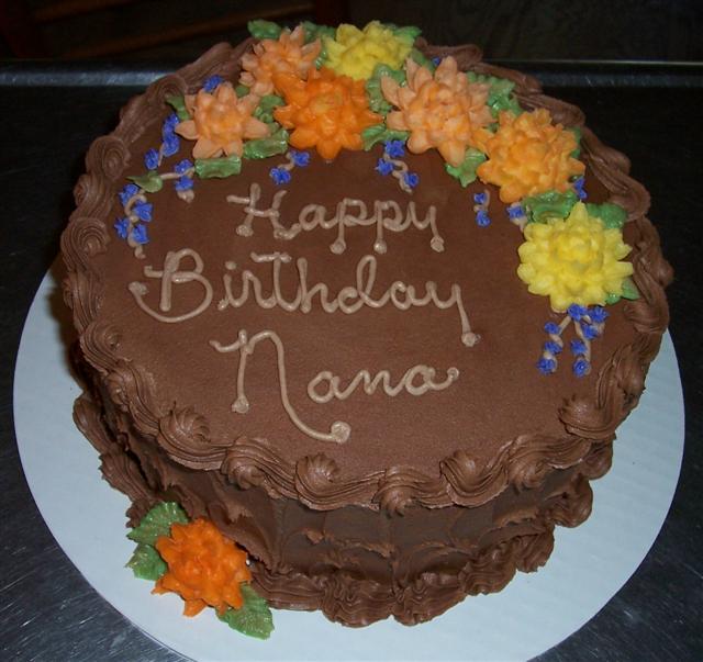 Yellow Cake with Chocolate Frosting and Flowers