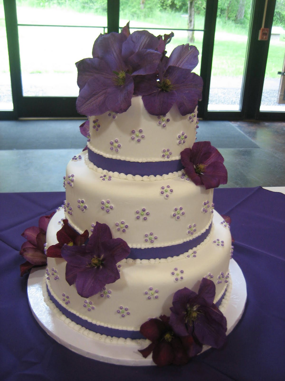 Wedding Cake with Purple Flowers