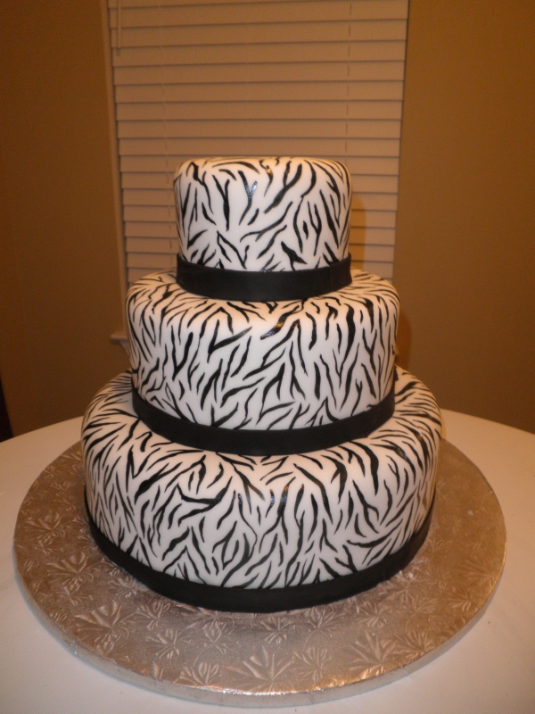 Zebra Print Wedding Cake with Cupcakes