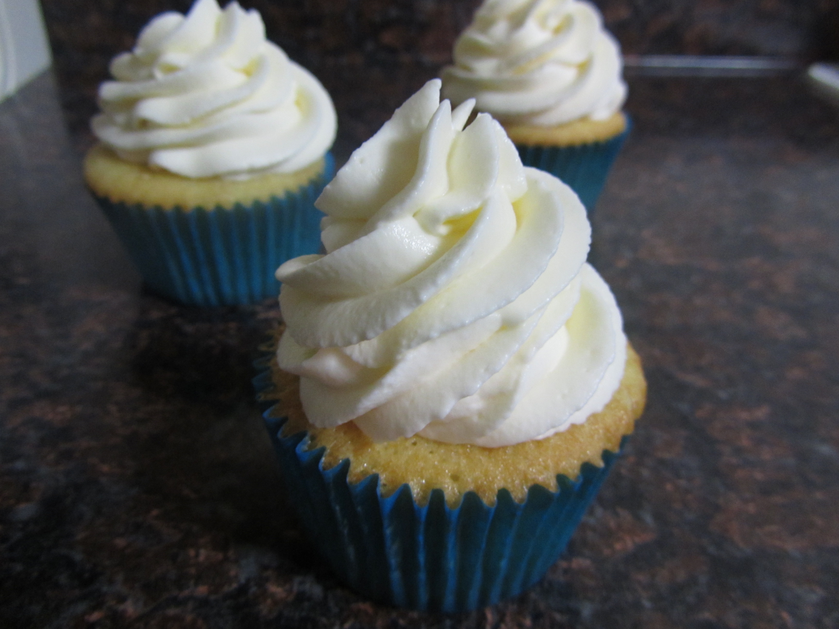 Vanilla Cupcakes with Whipped Cream Frosting