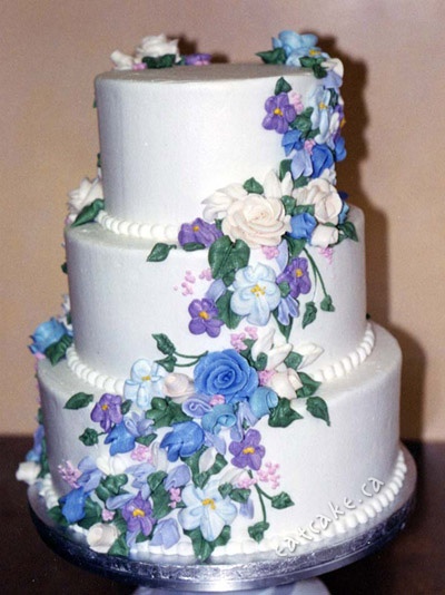 Buttercream Wedding Cake with Purple Flowers