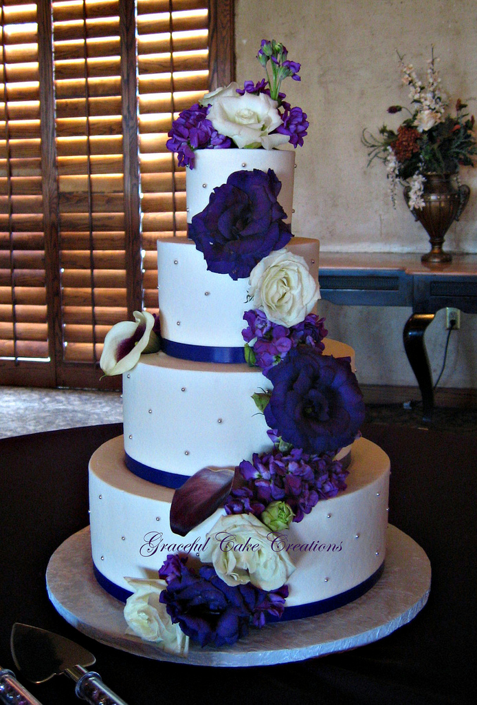 Buttercream Wedding Cake with Purple Flowers