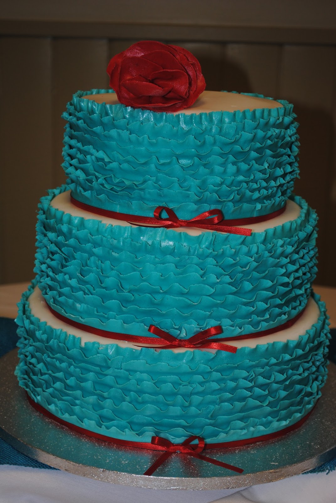 Red and Teal Wedding Cake