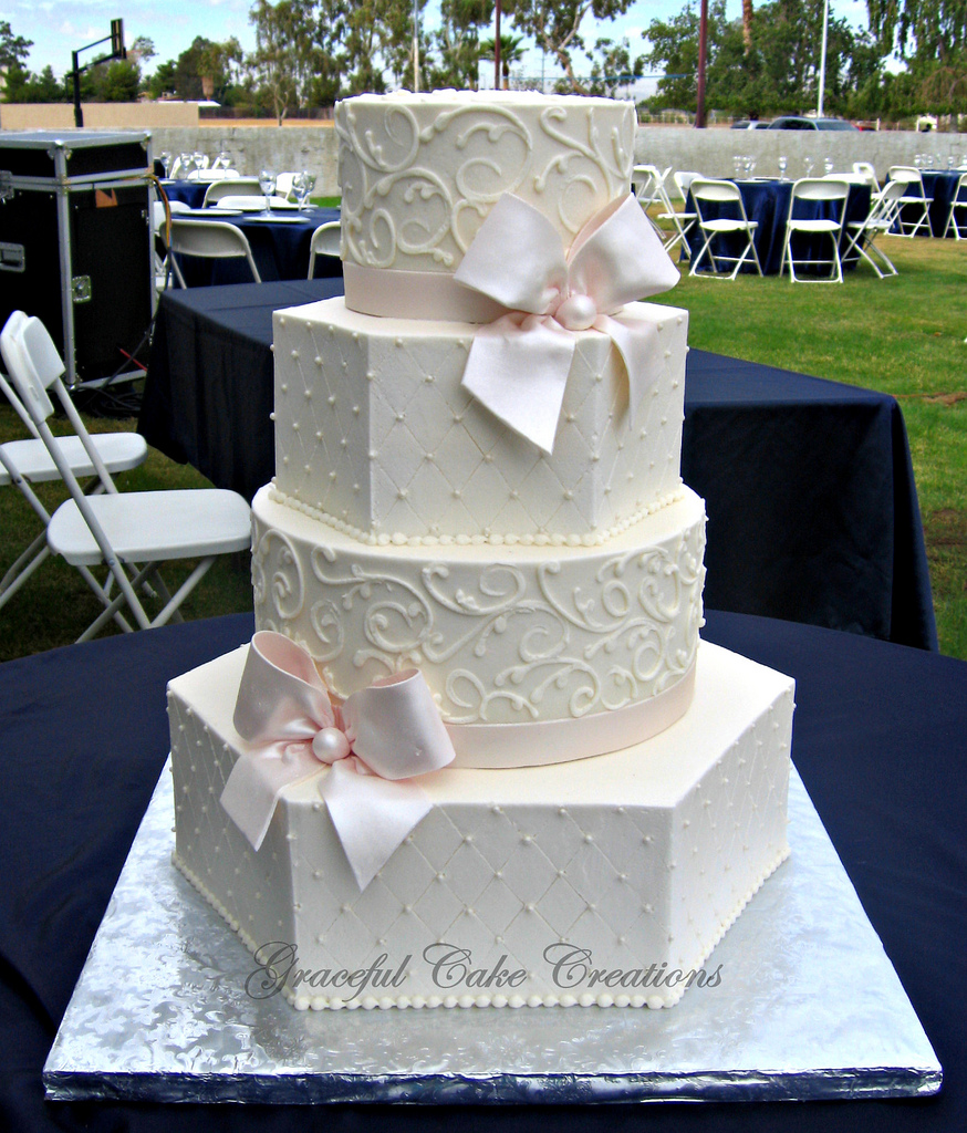 6 Photos of Hexagon Buttercream Wedding Cakes