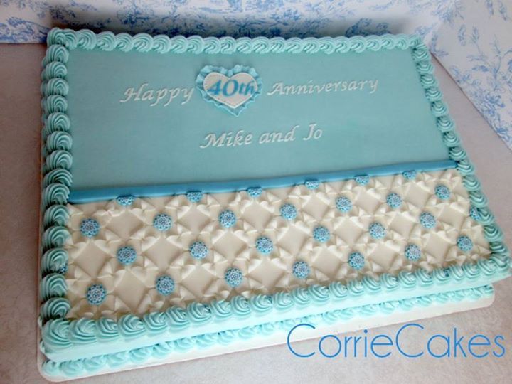 White Sheet Anniversary Cakes