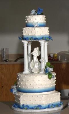 Four Tier Wedding Cake with Blue Flowers