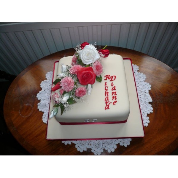 Red Square Wedding Cake with Ribbon and Flowers