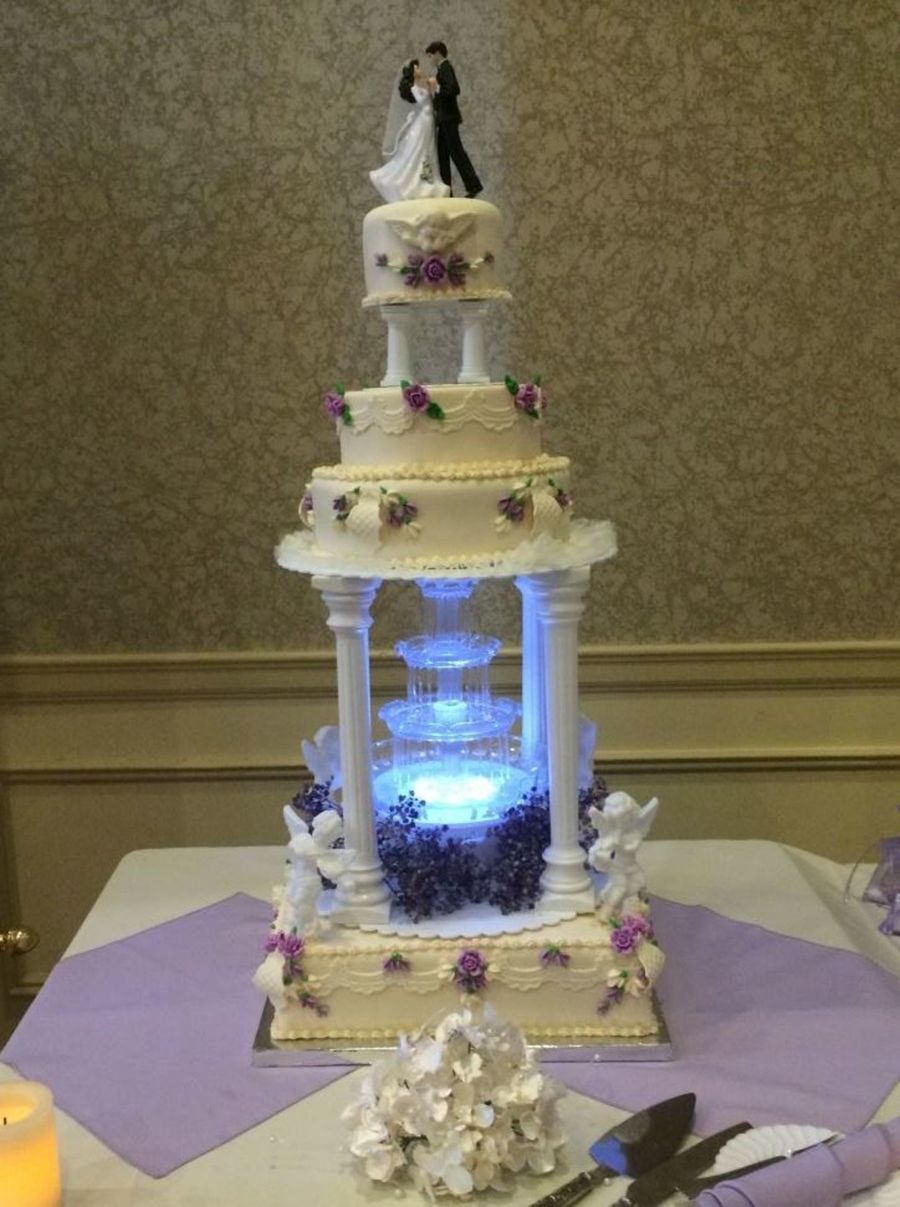 11 In Purple And Gold Wedding Cakes With Fountains Large Photo