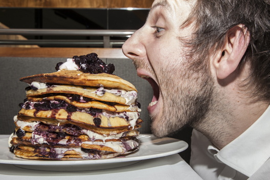 8 Photos of Person Eating Pancakes