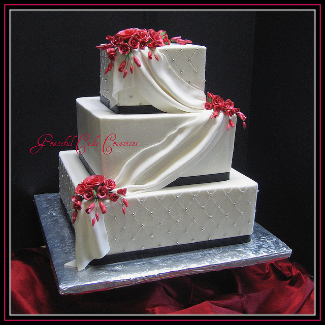 Black and White Wedding Cake with Red Roses