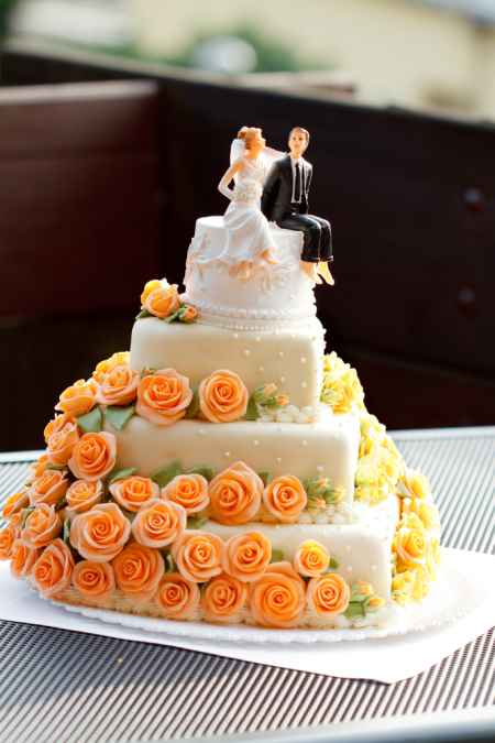 Yellow and Orange Wedding Cake with Flowers