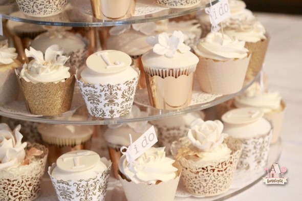 White and Gold Wedding Cake with Cupcakes