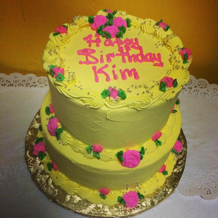 Pink and Yellow Cake with Flowers