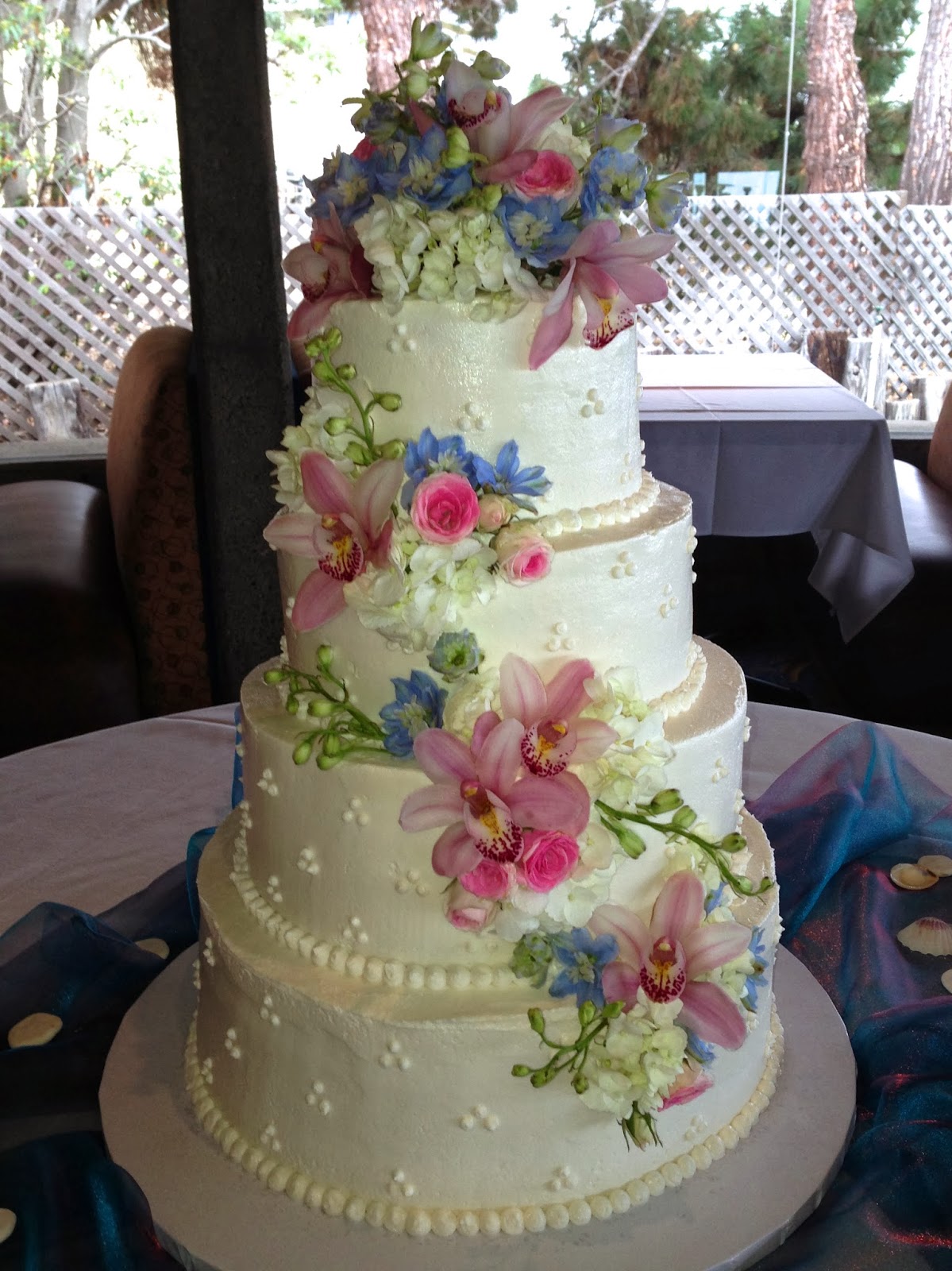 Buttercream Wedding Cake with Cascading Flowers