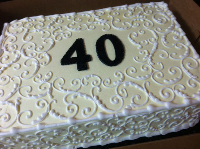 White Sheet Anniversary Cakes