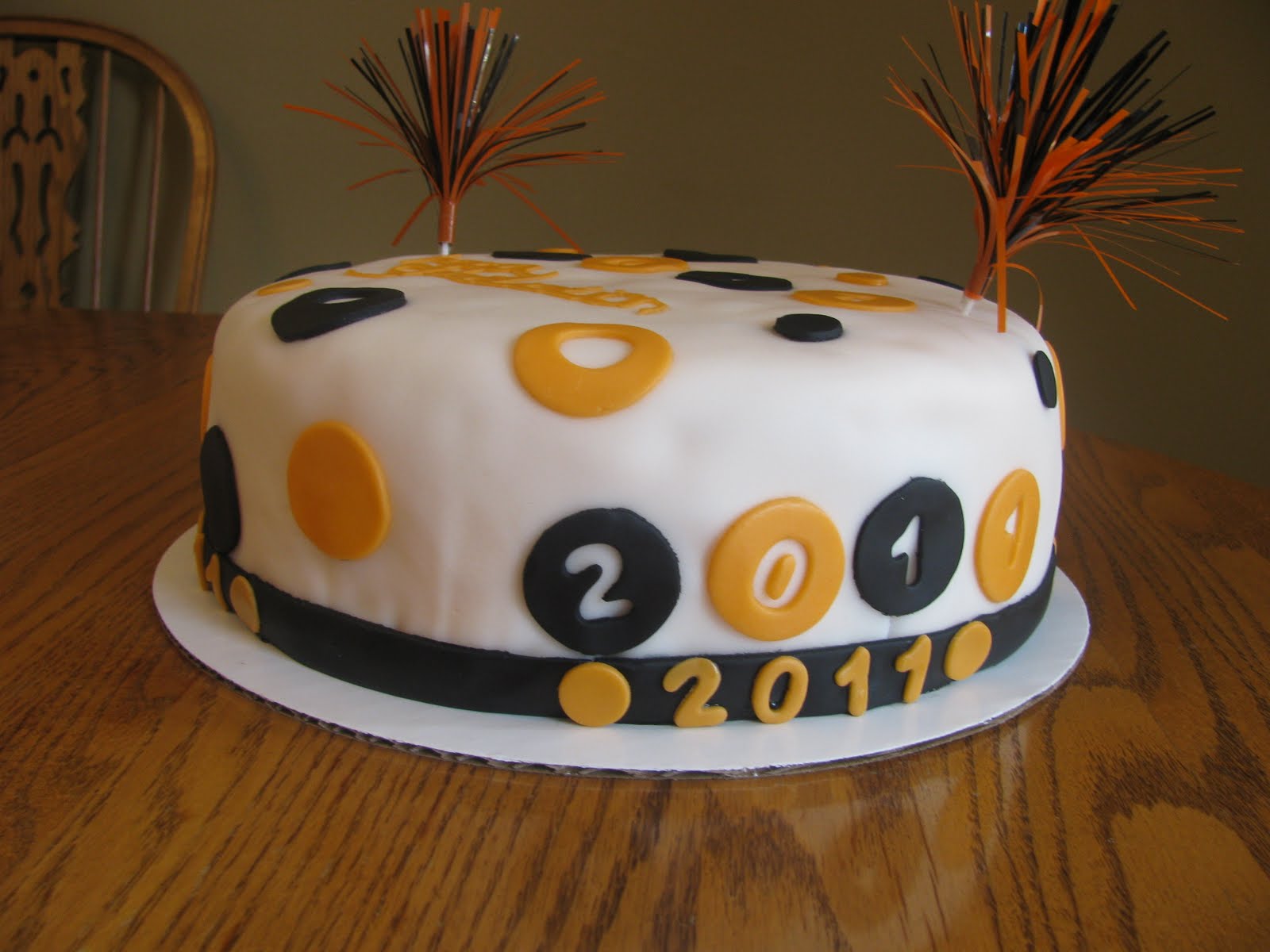 Orange and Black Graduation Cake