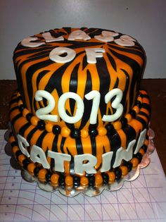 Orange and Black Graduation Cake