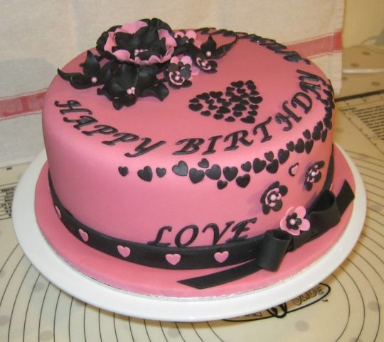 Black and Pink Birthday Cake with Flowers