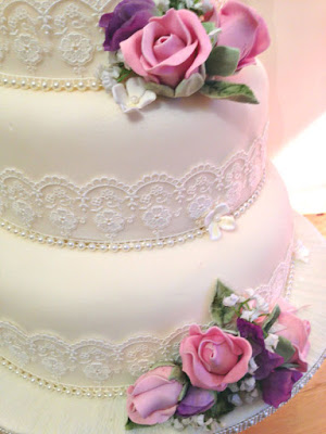 Wedding Cake with Pearls and Ribbon