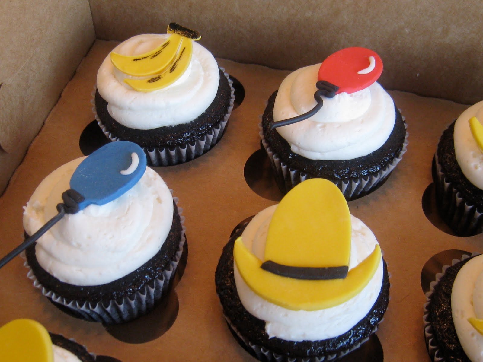 Curious George Themed Cupcakes