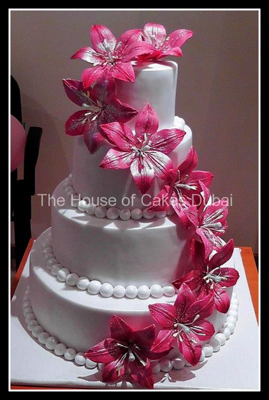 Wedding Cake with Fuschia Flowers