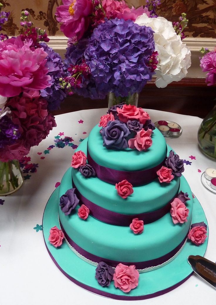 Turquoise and Purple Wedding Cakes with Flowers