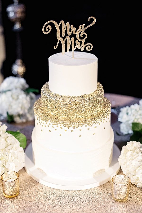 White and Gold Wedding Cake with Roses